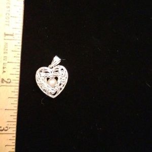 Solid 14kt gold pendant with a pearl